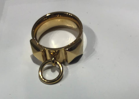 Ring with two studs and added small ring detail